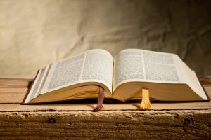 still life with bible on the desk